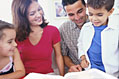 photo of a family reading